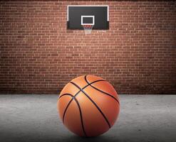 basketball Balle et basketball cerceau sur brique mur et ciment sol photo
