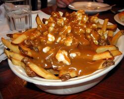 ai généré Poutine frites étouffé dans sauce et fromage Lait caillé photo