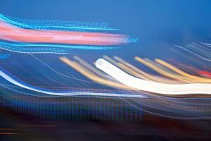 amusement parc flou effet. abstrait illuminé Contexte photo