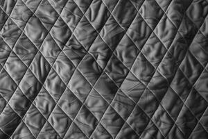 ai généré gris faux velours diamant matelassé couvre-lit en tissu texture photo