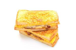 Pain doré jambon bacon fromage sandwich avec oeuf photo