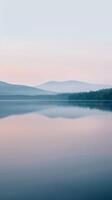 ai généré tranquille Lac reflets à Aube photo