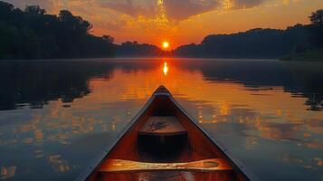 ai généré bateau voile sur rivière à le coucher du soleil photo