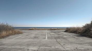 ai généré vide parking lot par le océan photo