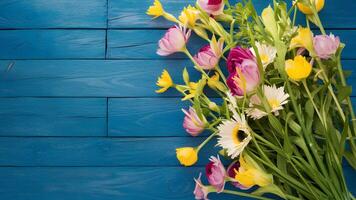 ai généré image de stock printemps Contexte avec rustique fleurs sur bleu en bois table photo