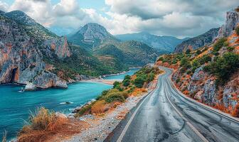 ai généré coloré route par montagnes par le mer photo