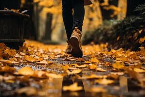 ai généré une proche en haut de une personne pieds en marchant par une sentier couvert dans déchue feuilles. génératif ai photo