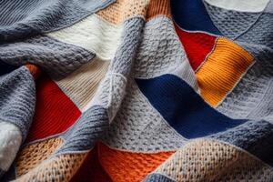 ai généré une confortable tricoté couverture dans une patchwork modèle. génératif ai photo