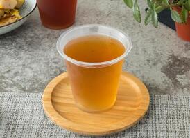 hiver melon thé servi dans jetable tasse isolé sur serviette de table Haut vue sur table Taïwan nourriture photo