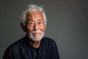ai généré portrait de asiatique Sénior homme sur une foncé gris Contexte photo