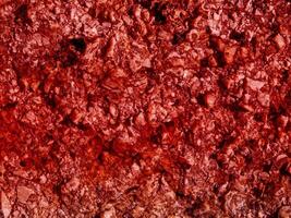 texture de pierre rouge dans le jardin photo