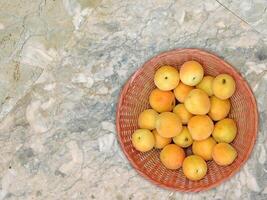 abricots sur marbre Contexte photo