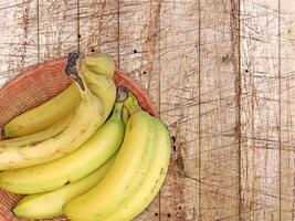 bananes sur le en bois Contexte photo