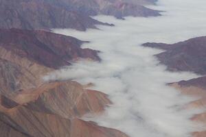 aérien vue de des nuages entre montagnes Pérou Sud Amérique photo