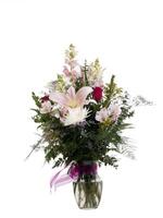 floral arrangement dans clair verre vase ruban photo