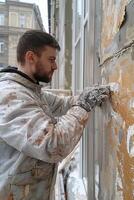 ai généré une homme des peintures le des murs et plafond. réparation concept photo