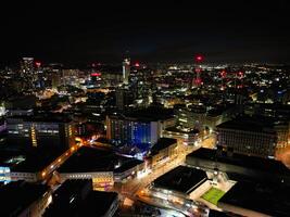 aérien nuit vue de illuminé ville centre bâtiments de Birmingham central ville de Angleterre uni Royaume. Mars 30e, 2024 photo