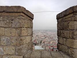 panorama de Naples de castel Saint-Elme des offres une Stupéfiant vue de le de la ville vibrant des rues, historique Repères, et le fascinant beauté de le baie de Naples photo