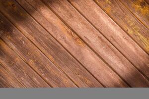 en bois mur fabriqué de diagonale planches avec lumière marron rayures. arrière-plan.1 photo