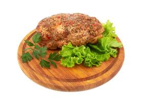 cuit Viande sur Coupe planche photo