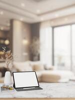 une numérique tablette maquette sur une luxe blanc marbre dessus de la table dans un élégance contemporain vivant chambre. photo