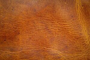 marron cuir abstrait de un vieux journal couverture avec rayures, Des marques et taches photo