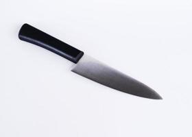 couteau utilitaire isolé sur fond blanc photo