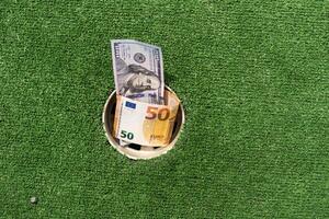 mini le golf club, argent sur le artificiel herbe photo