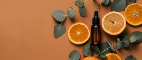 bouteille de essentiel pétrole avec des oranges et eucalyptus feuilles photo