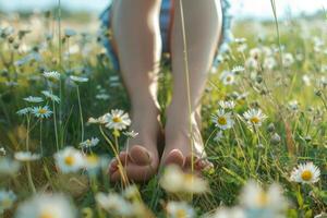 ai généré détendu été journée avec femelle jambes dans épanouissement Prairie photo