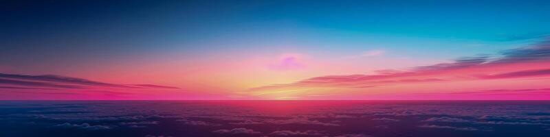 surréaliste le coucher du soleil au dessus le des nuages avec vibrant rose et bleu teintes photo