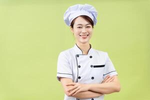 photo de Jeune asiatique femelle chef sur Contexte