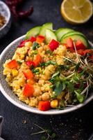 boulgour avec pois chiches et des légumes photo