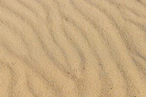 sables de sérénité embrassement le beauté de Naturel motif sables, une tranquille tapisserie de la terre motifs photo