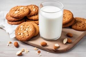 Lait avec biscuits sur blanc en bois arrière-plan.. photo