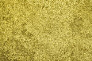 texture de d'or décoratif plâtre ou béton. abstrait or grunge Contexte. photo