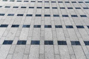 le texture de une monotone carrelé chaussée avec perspective. photo