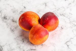 mûr sucré juteux Frais rouge nectarines photo