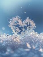 macro Capturer de une en forme de coeur flocon de neige chute, contre une doux et lumière pastel bleu Contexte. photo