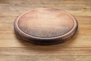 rustique en bois planches Contexte avec Pizza Coupe planche. photo