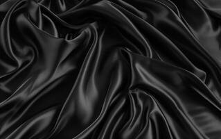 spectaculaire plis et ondulations de encre noir satin tissu, exsudant une lisse et mystérieux séduire avec le chatoyant textile. photo