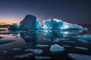 icebergs flotte dans le l'eau à le coucher du soleil photo