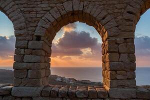 le coucher du soleil vue de le ruines de le ancien ville de kos photo