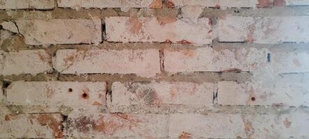 foncé brique mur avec rustique texture photo