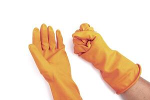 Orange caoutchouc gants isolé sur une blanc Contexte photo