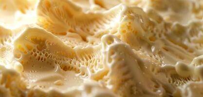 Haut vue de délicieux vanille la glace crème texture proche en haut. photo
