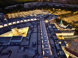 aérien vue de illuminé central Dartford Londres ville de Angleterre pendant nuit. Angleterre Royaume-Uni. avril 14ème, 2024 photo