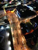 aérien nuit vue de illuminé ville centre bâtiments de Birmingham central ville de Angleterre uni Royaume. Mars 30e, 2024 photo