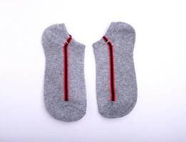 magnifique doux court chaussettes isolé sur blanc Contexte. photo