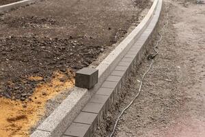 construction placer, construction de une route et une trottoir photo